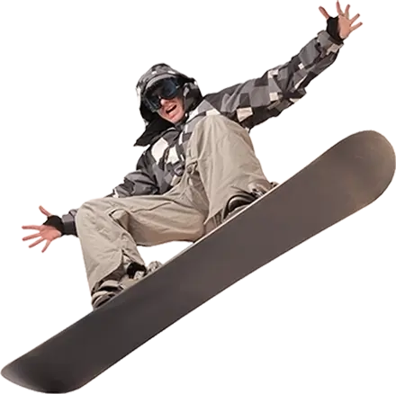 Happy snowboarder in cream and light brown snow clothes performing an aerial trick with both arms stretched out.